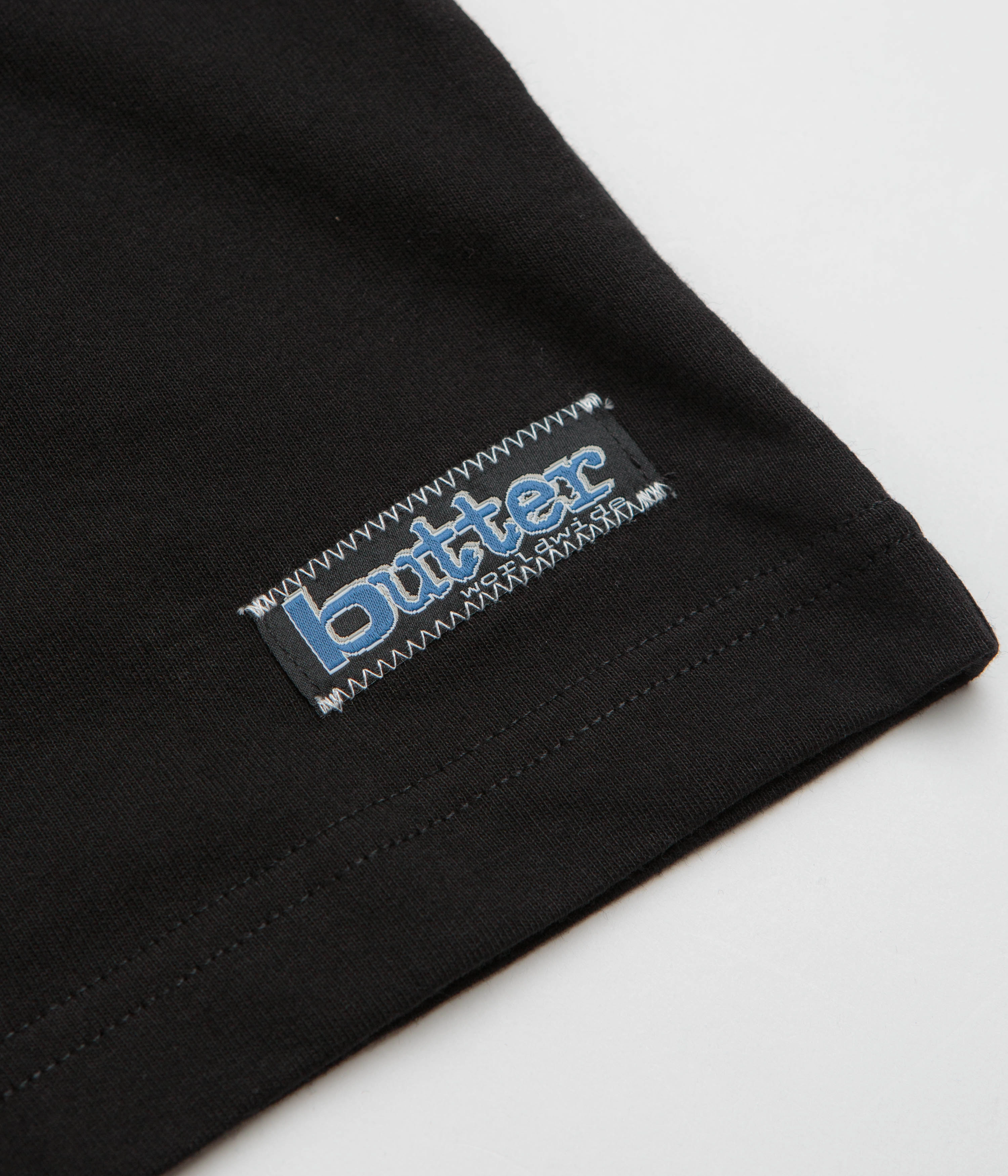 Butter Goods Worldwide Panelled T-Shirt - Black moisture resistant adjustable sleeves