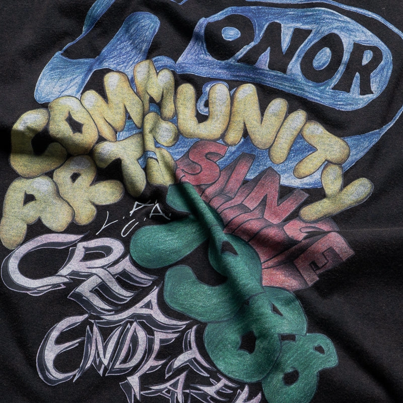 office scene Honor The Gift Comm Arts Creative Tee - Black