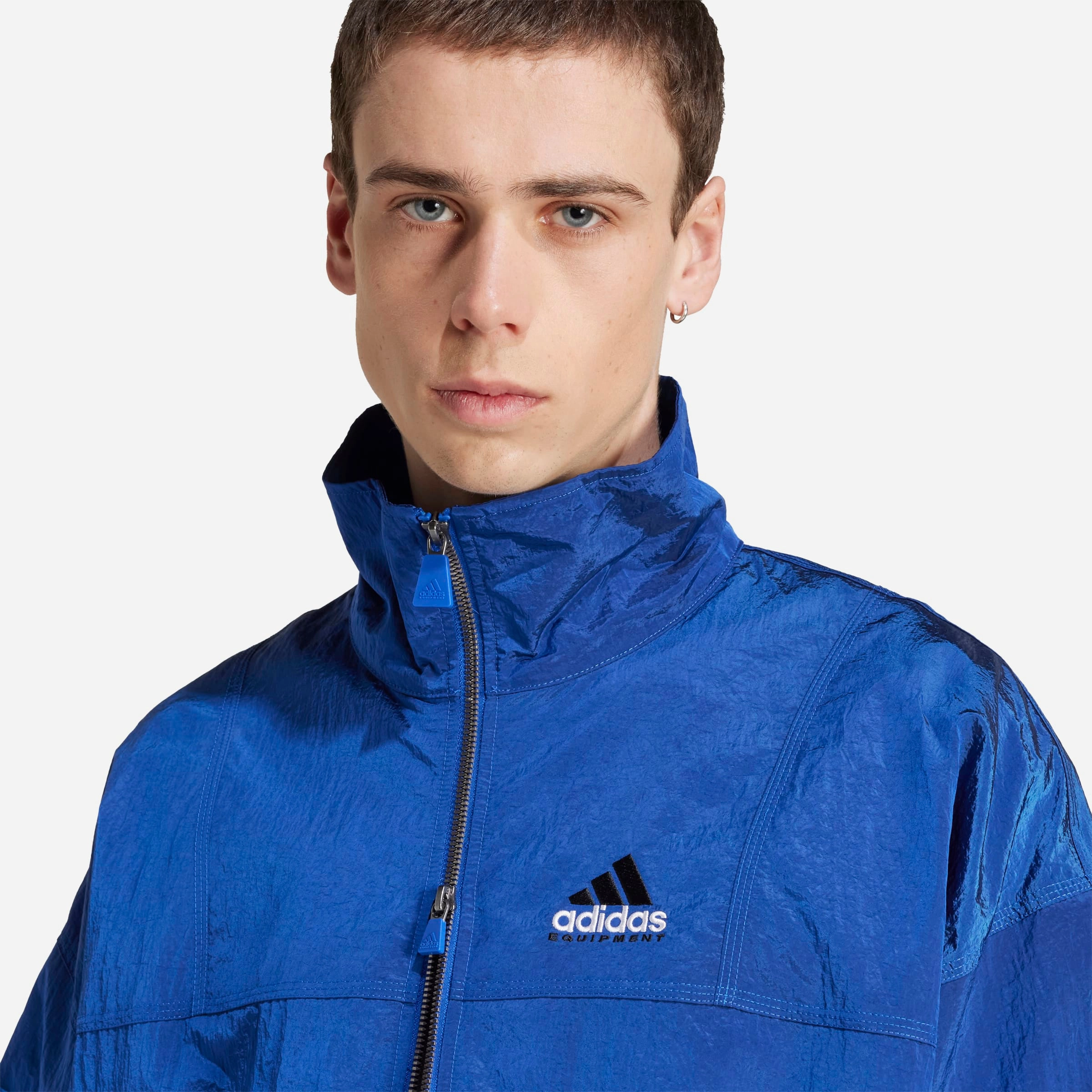 Non Restrictive Silhouette City Life EQT Track Top
