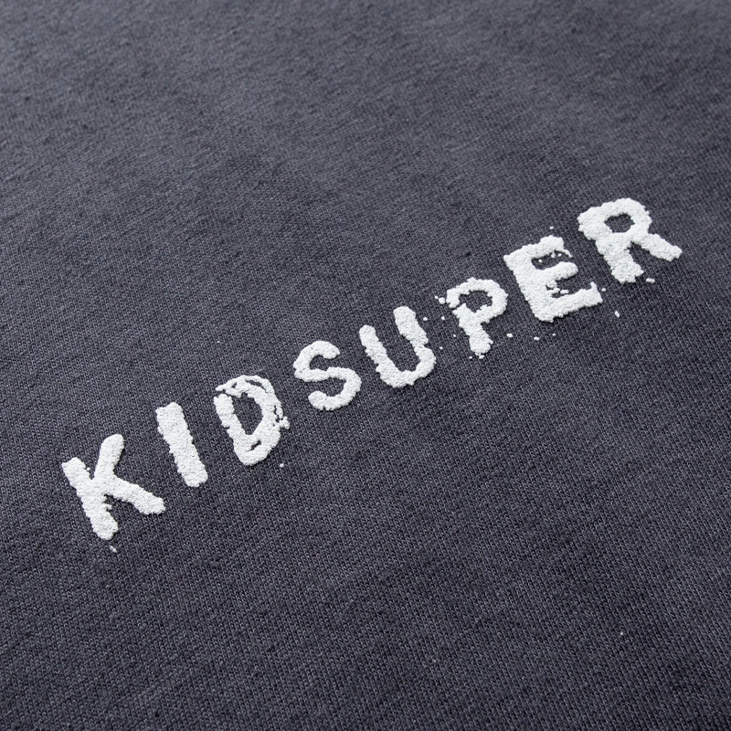 KidSuper Low Center Mini Logo Tee - Washed Black Removable part bar