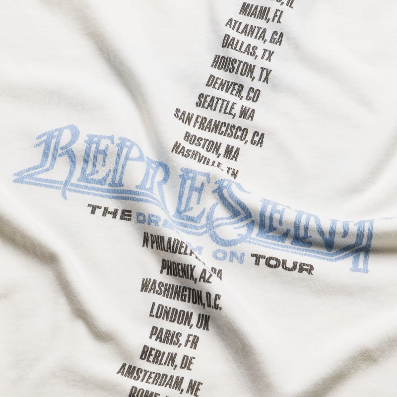 helicopter venue fall season Represent Golden Tour Tee - Flat White